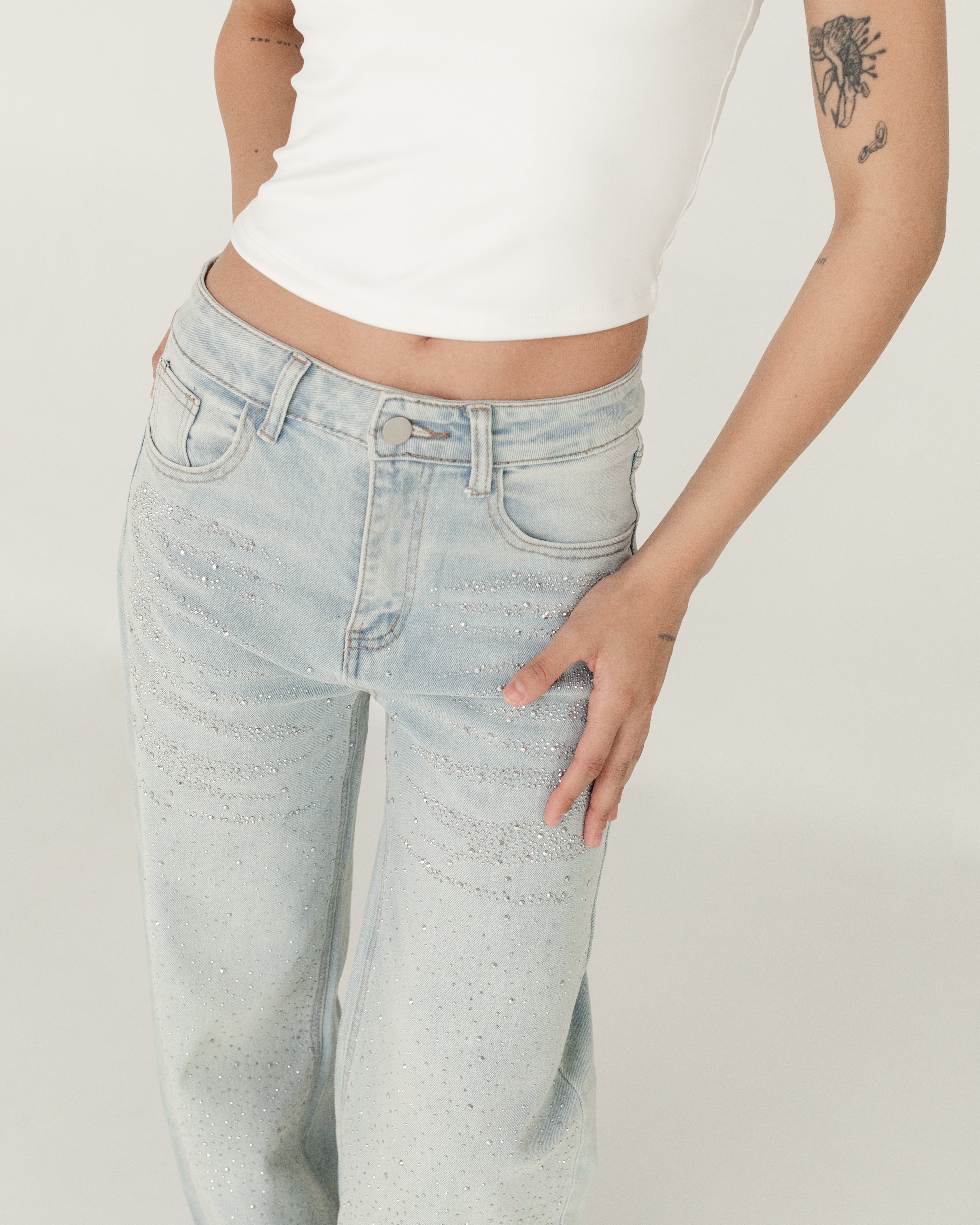 Pantalón denim con brillos